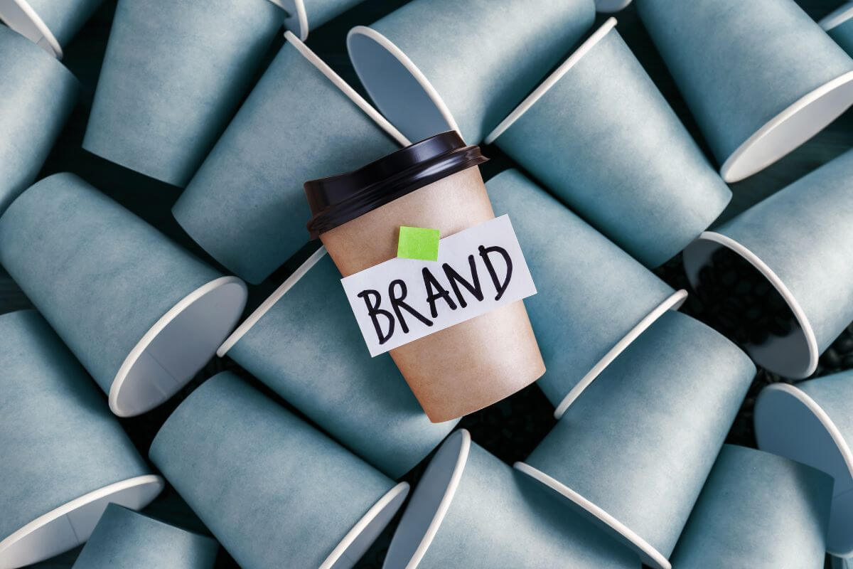 The word "brand" on a coffee cup