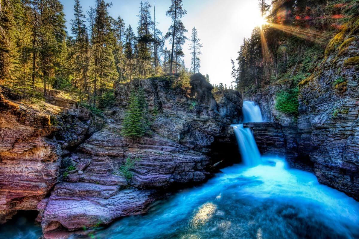 A waterfall in the middle of a rocky canyon in Montana.