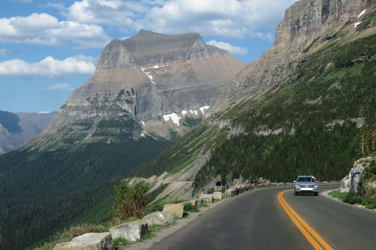The best Montana vacations include thrilling drives down scenic mountain roads.