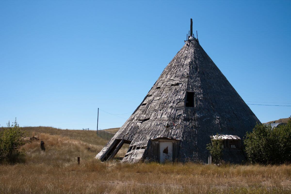 An old teepee in the middle of a field in Montana.