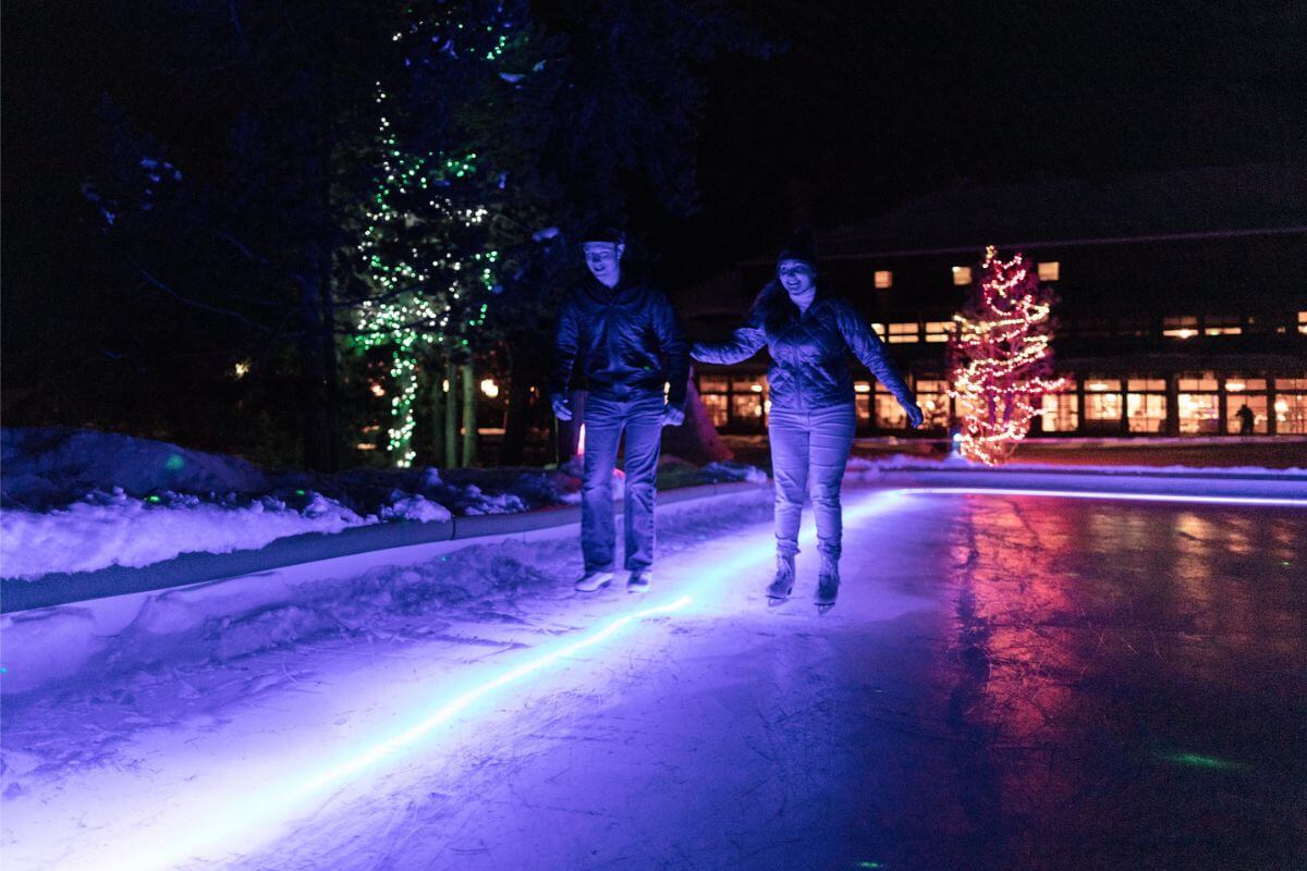 Two people ice-skating in Kalispell, Montana