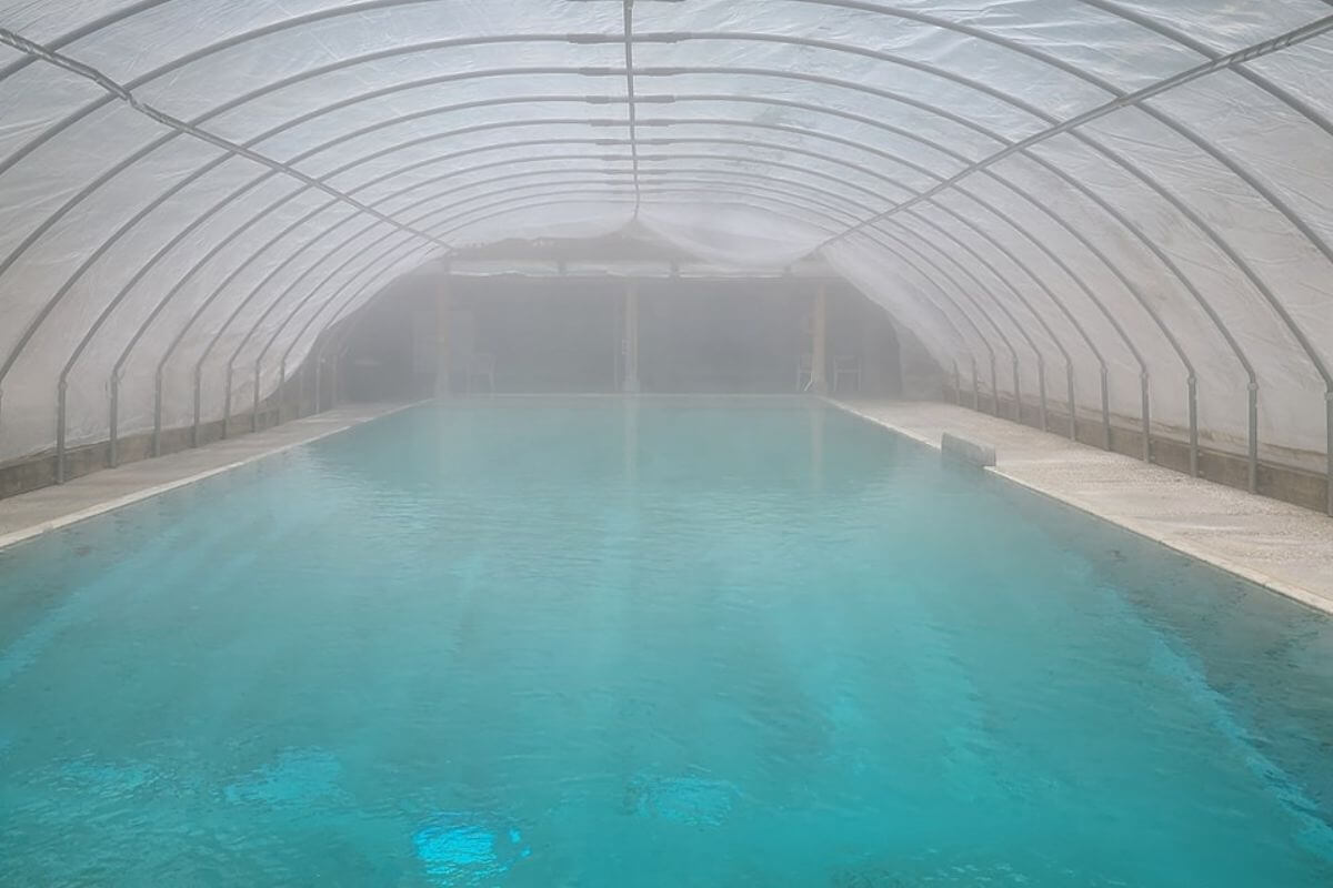 A steaming indoor swimming pool in Lost Trail Hot Springs in Fairmont, Montana
