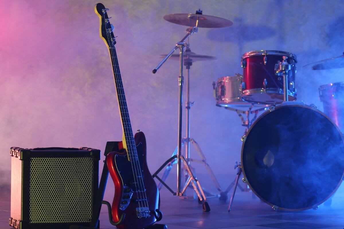 A drum set featuring a guitar.