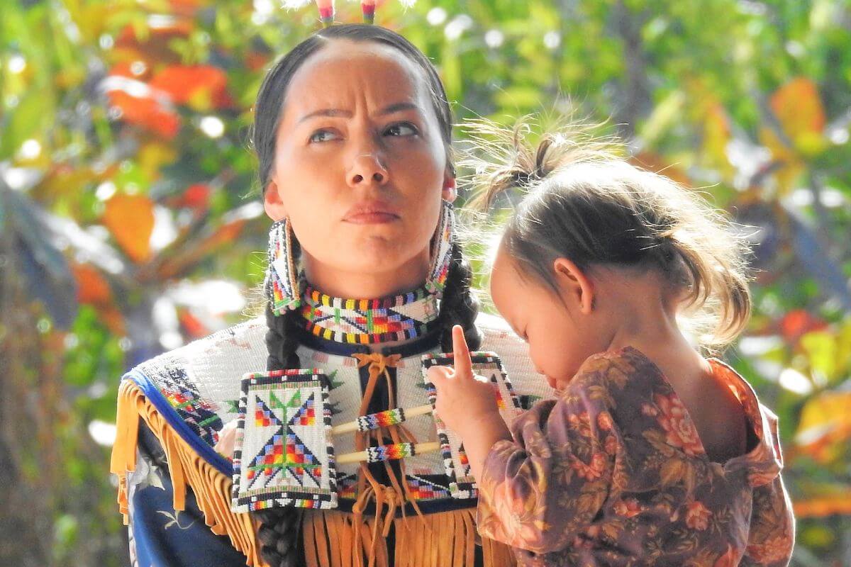 A Native American woman with a child in Montana.