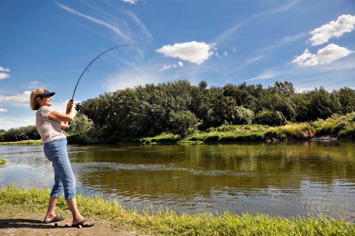 Woman Fishing on a Lake in Montana