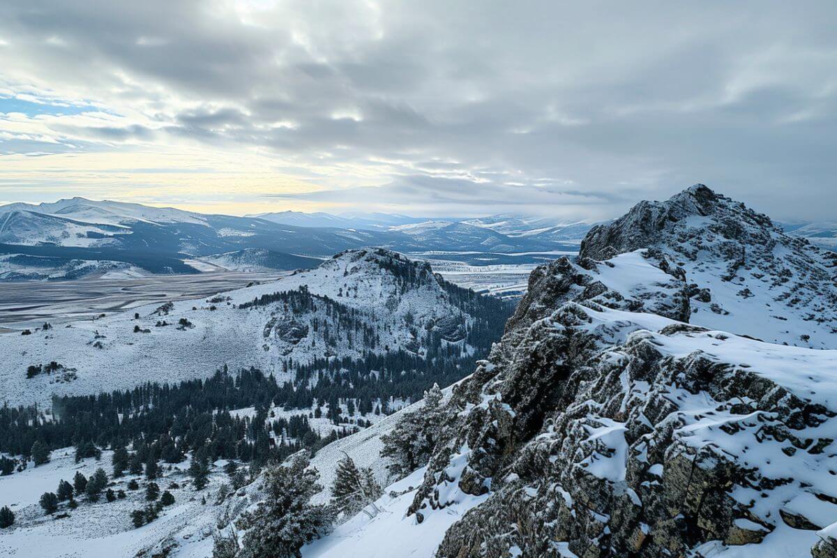 A view from the top of a snow-capped mountain in Montana.