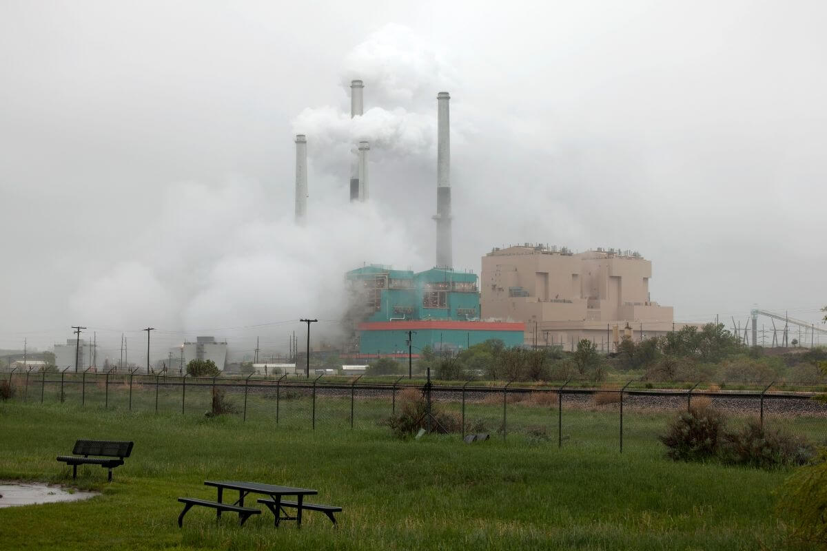 A large power plant emitting smoke
