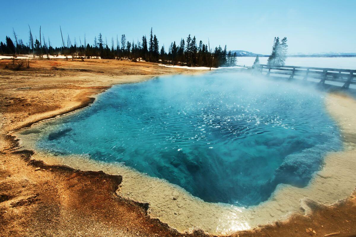Enjoy hot springs in Yellowstone National Park, one of the best guys getaways in Montana.