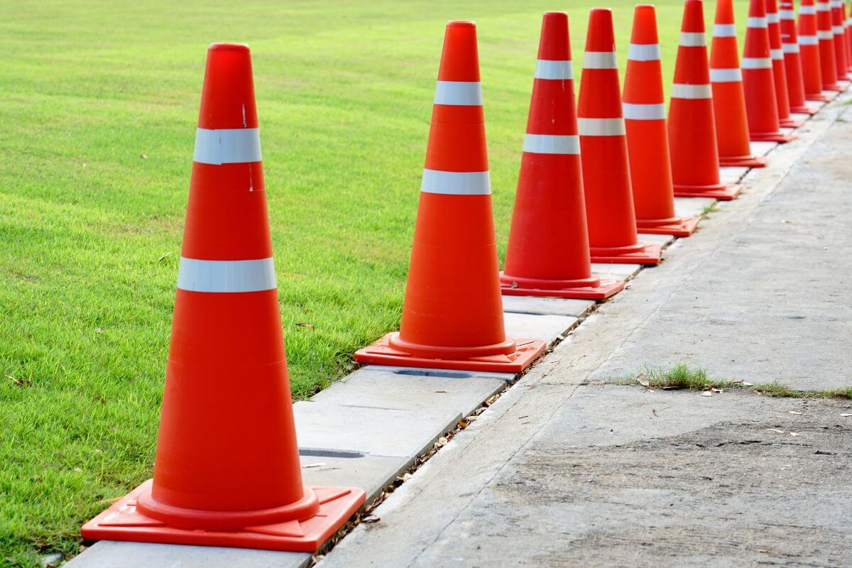 A row of orange and white traffic cones in Montana