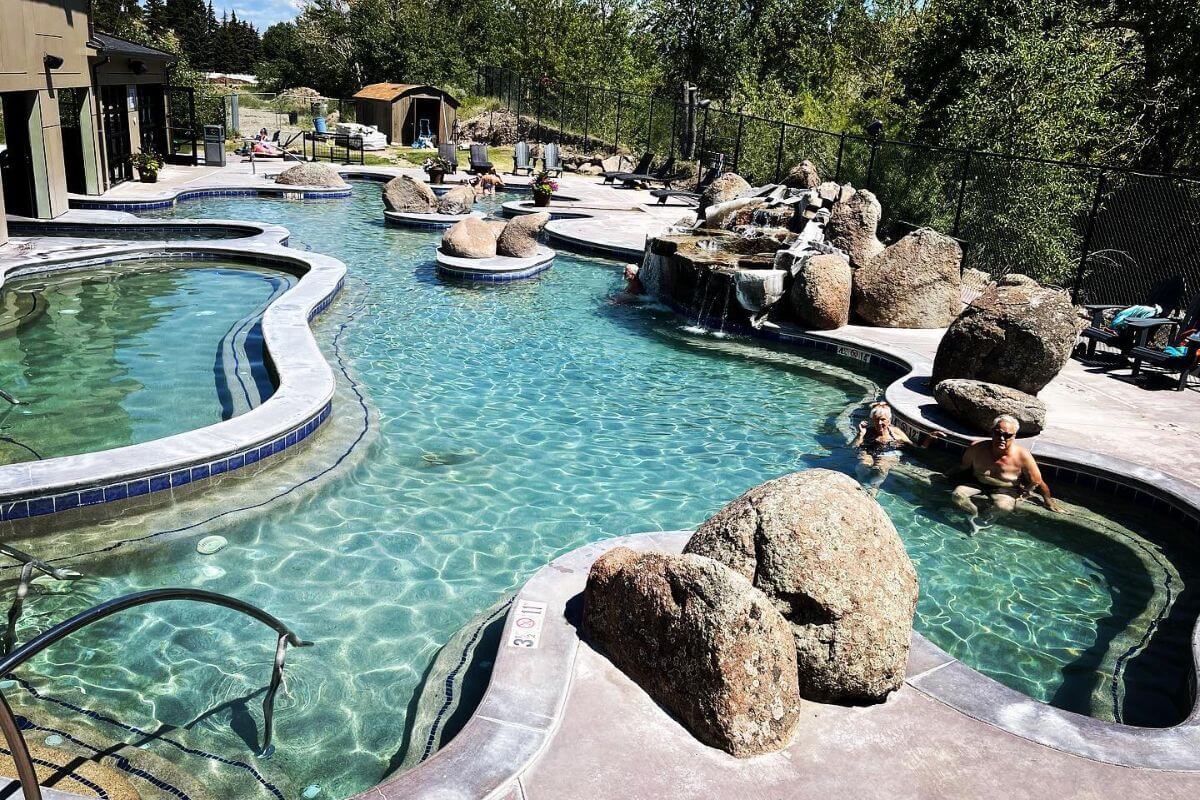 Hot spring pools decorated with large rocks at Broadwater Hot Springs in Montana