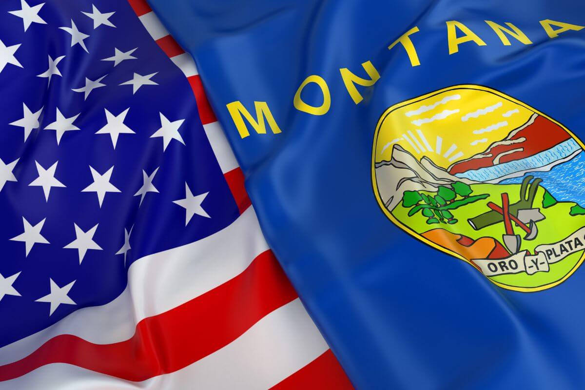 The flag of Montana and the flag of the United States.