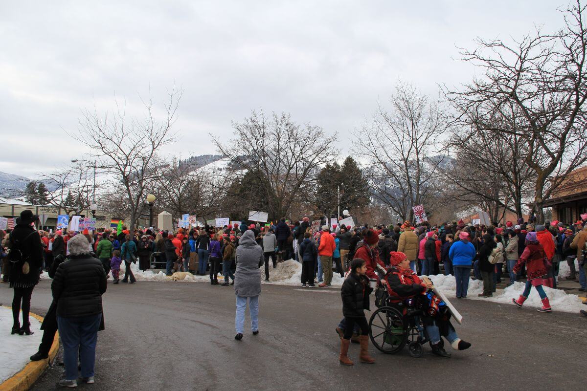 A crowd of people standing outside in Montana