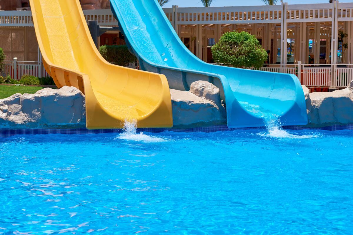 A blue and yellow standard water slide at a top waterpark resort in Montana.