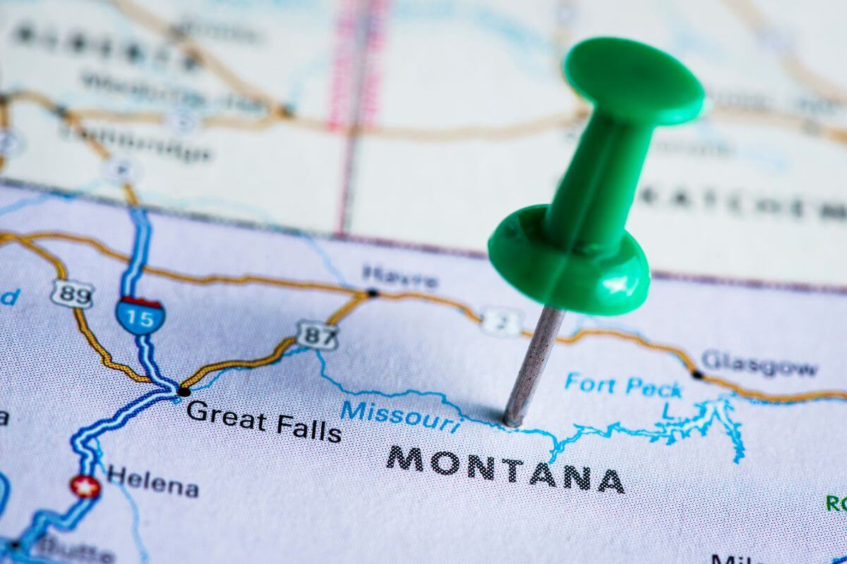 A green pin is pinned on a map of Montana.