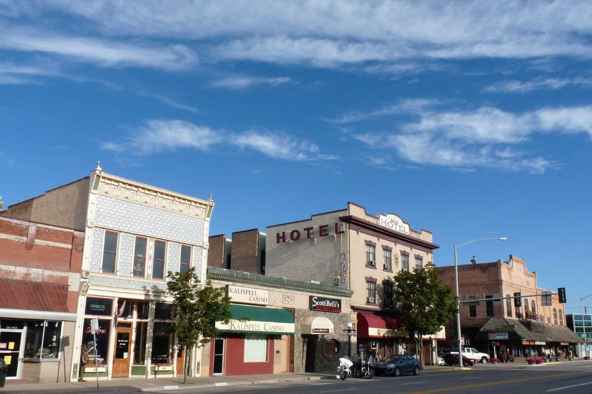 Downtown Kalispell in Montana with many buildings such as a hotel and casino.