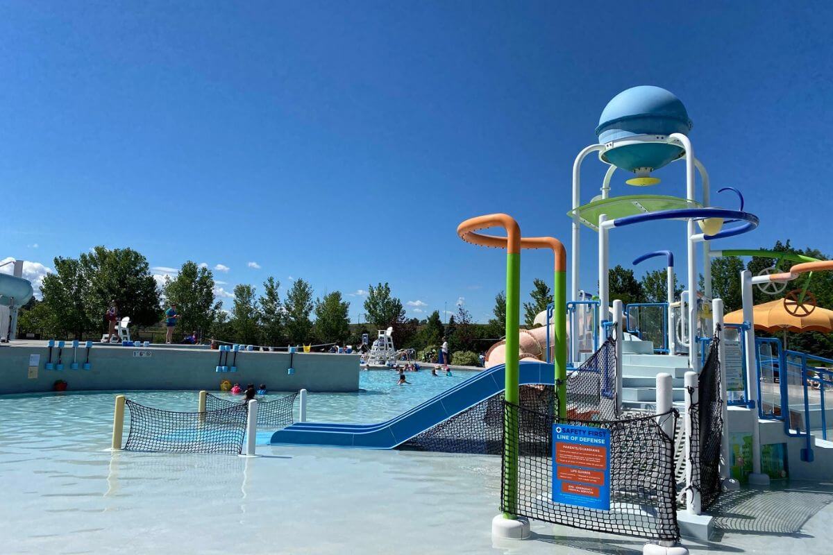 A close up of the kids' play area in Oasis Waterpark's large outdoor pool