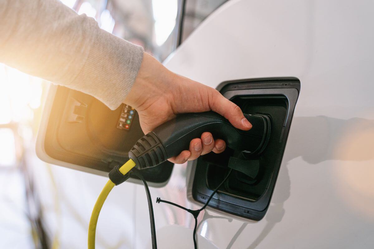 A person is charging an electric car in Montana.