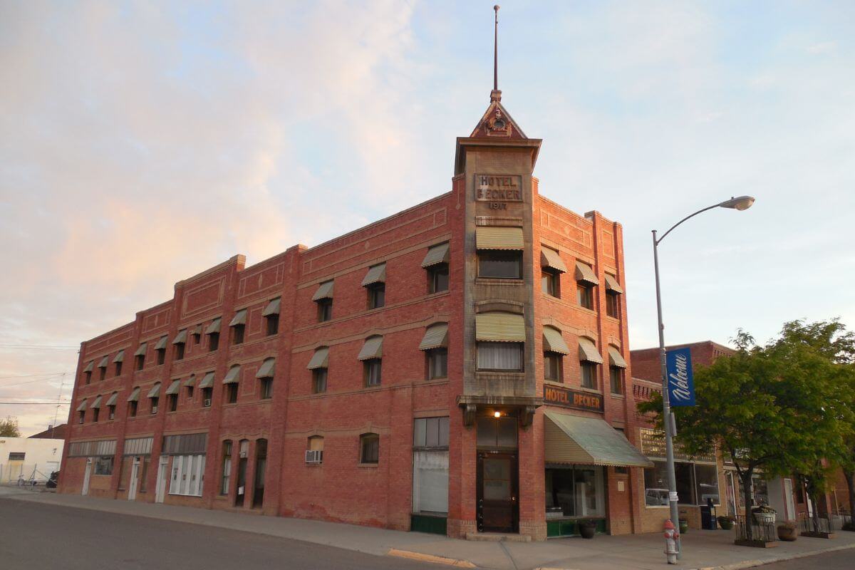 A brick building with a clock tower in Hardin, Montana.