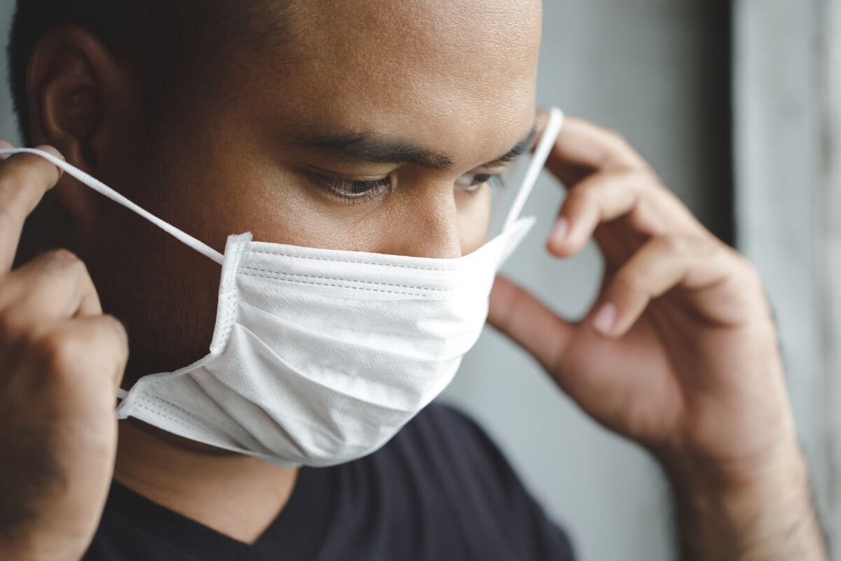 A man wearing a surgical mask
