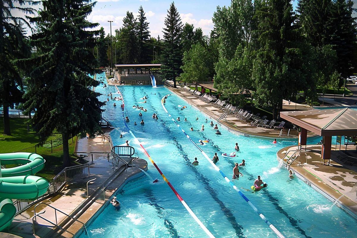 A view of guests enjoying the large pool at Woodland Waterpark in Montana.