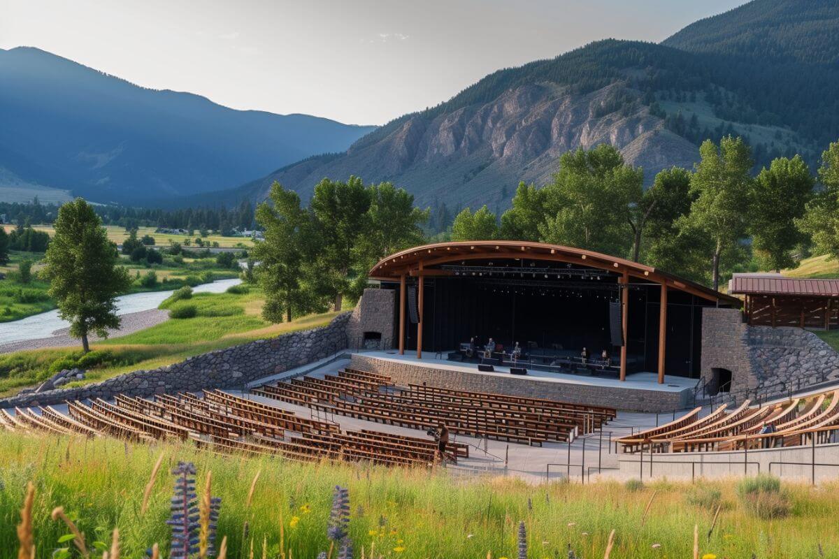 A Montana amphitheater with seats and a river in the background.