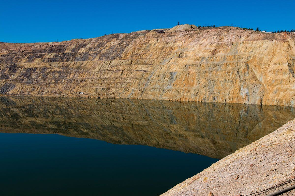 Berkeley Pit in Montana, an open pit copper mine with a lake inside.