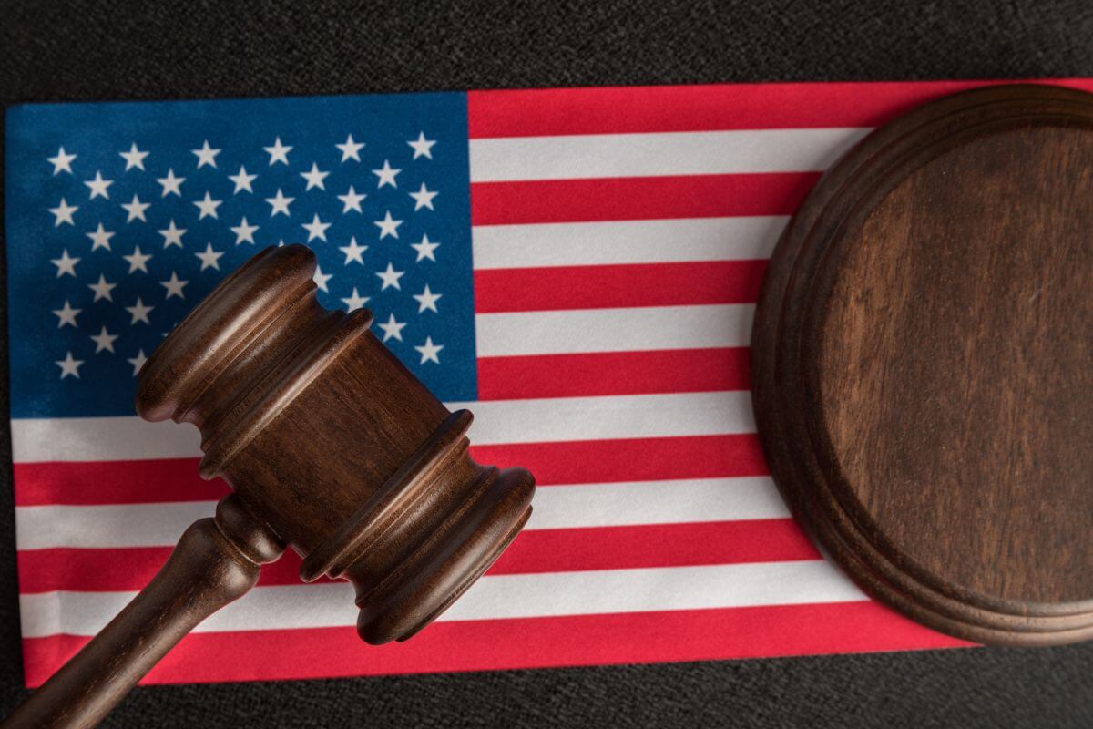 United States Flag Beneath a Gavel and Sounding Block