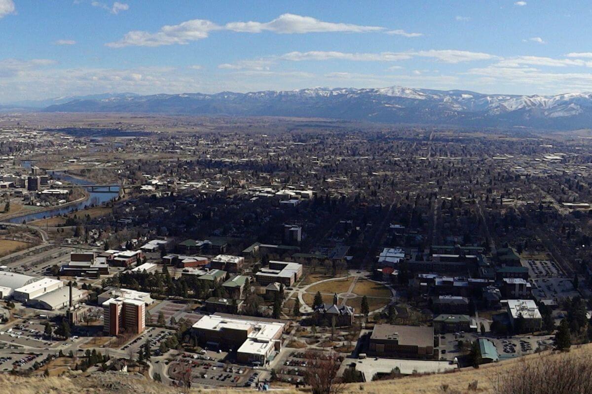 An Aerial View of Missoula Montana With Valleys in the Background