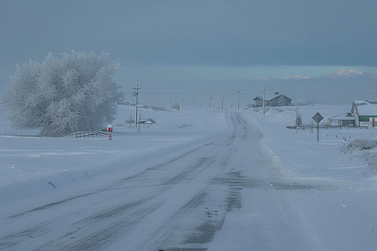 A road in Browning, Montana covered in snow during winter.