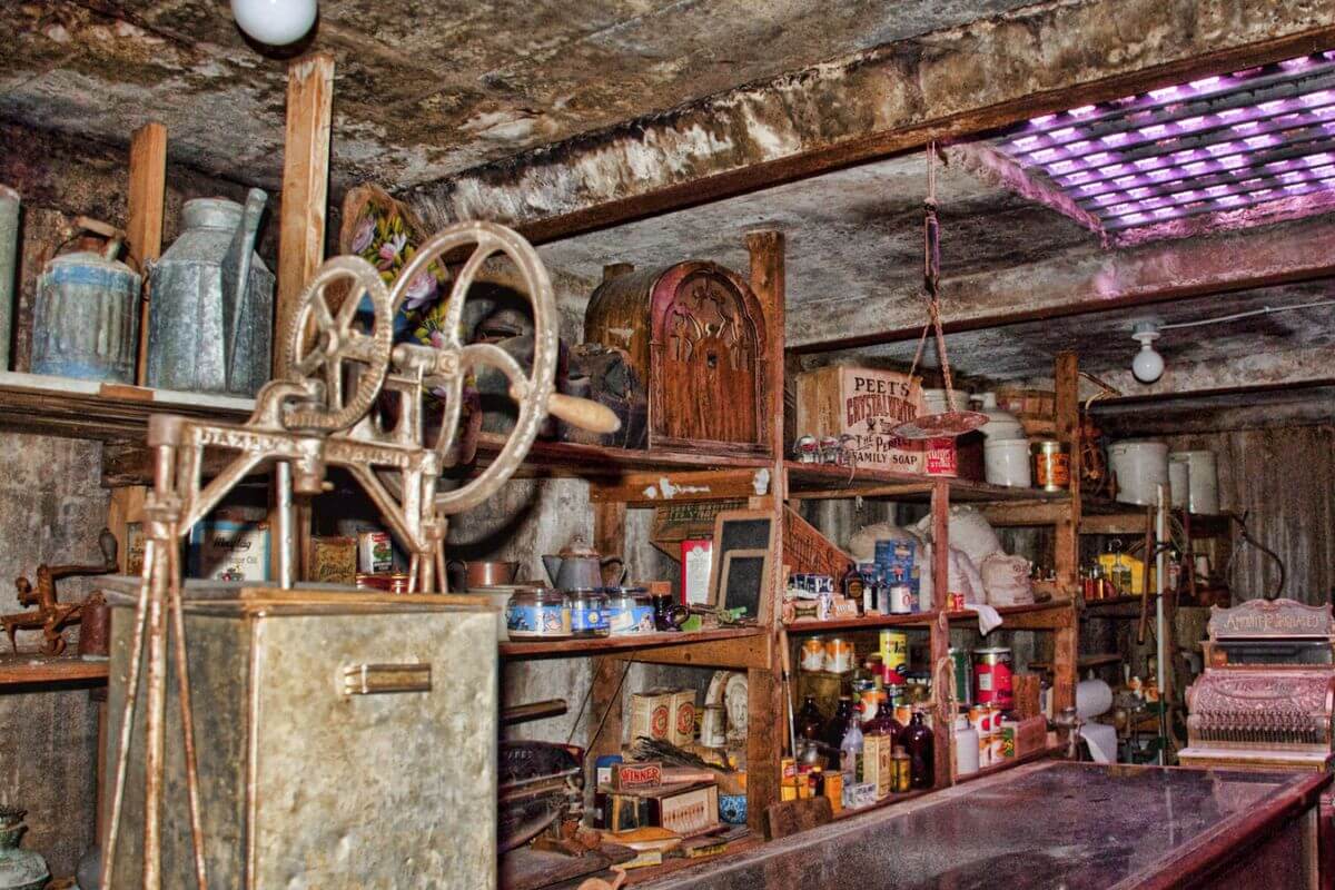 An underground room of Havre Beneath the Streets in Montana filled with a multitude of old items.