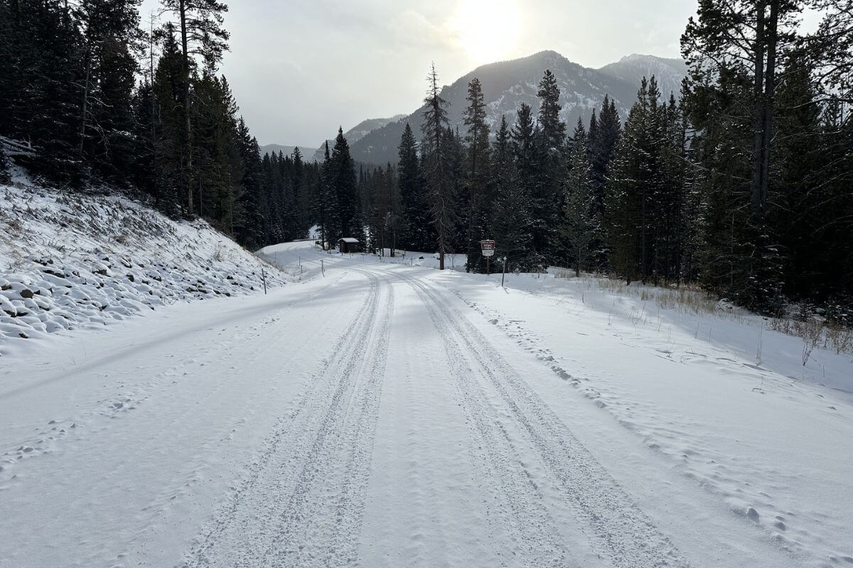 A snow-covered Hyalite Canyon Road, perfect for Montana motorcycle tours.