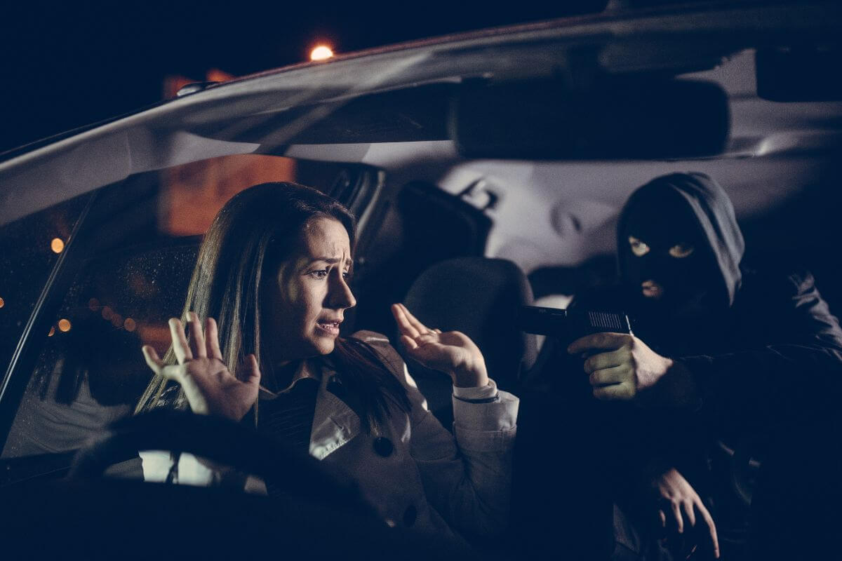 A man mugging a woman inside a car in Montana.