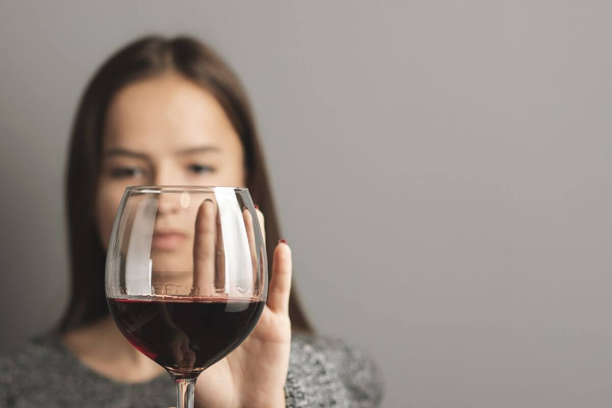 Teen Girl Refusing a Glass of Wine