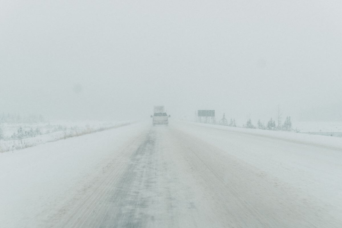 A truck navigating a snow storm in Montana