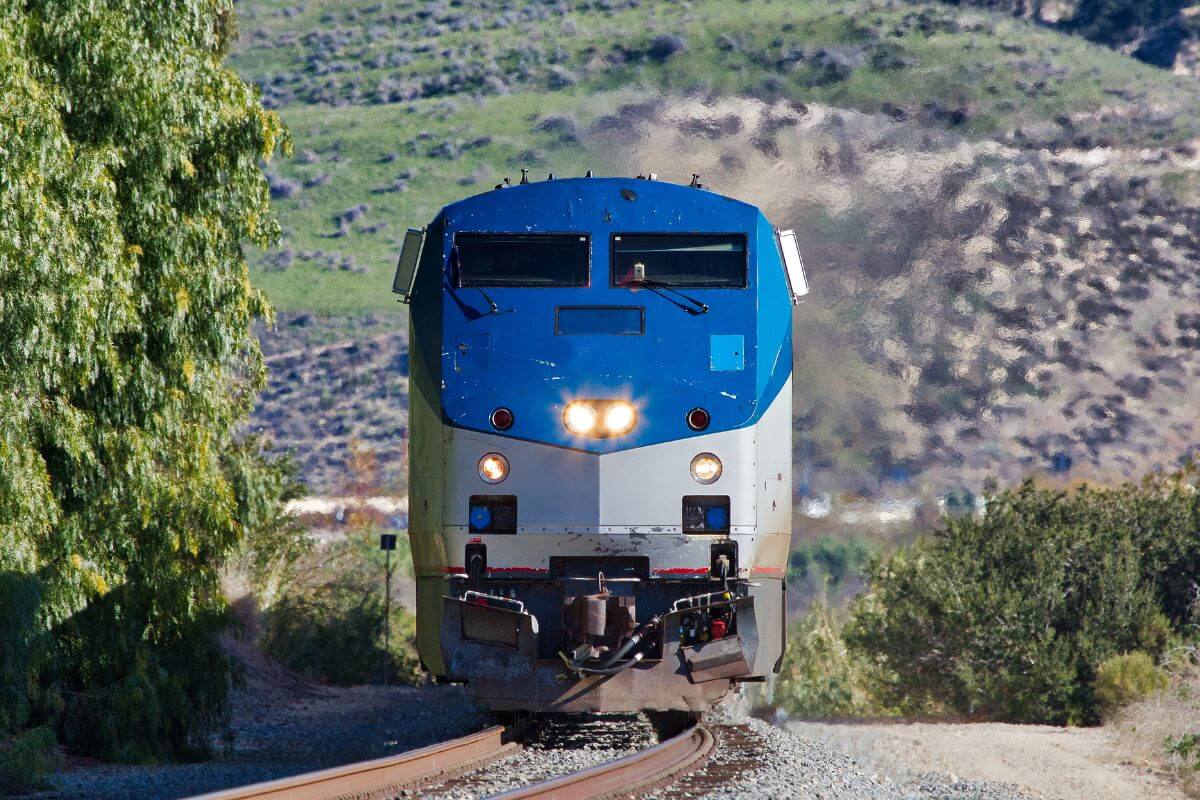 The Amtrak Empire Builder speeds along the tracks during Montana train tours.