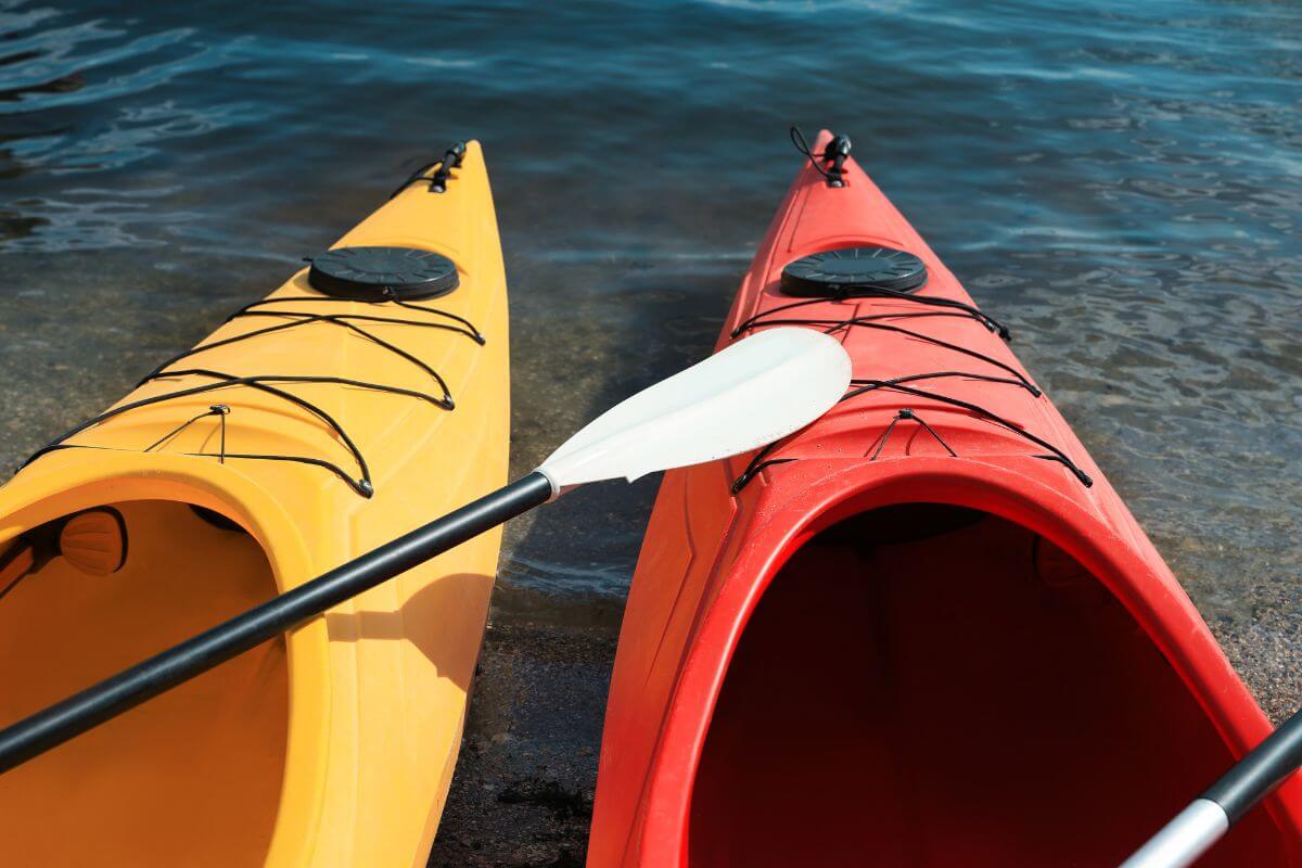 A pair of red and yellow canoes offered by boating companies around the Yellowstone area near Knowles falls