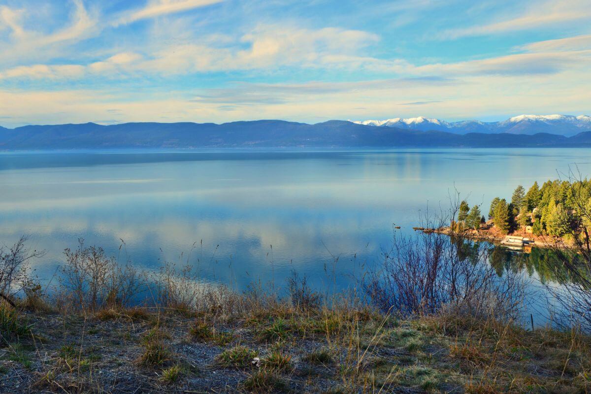 A scenic view of Flathead Lake from its shore.