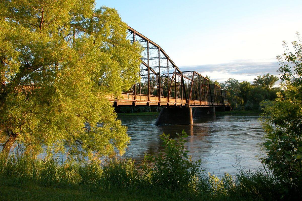 A bridge spanning a picturesque river in Fort Benton.