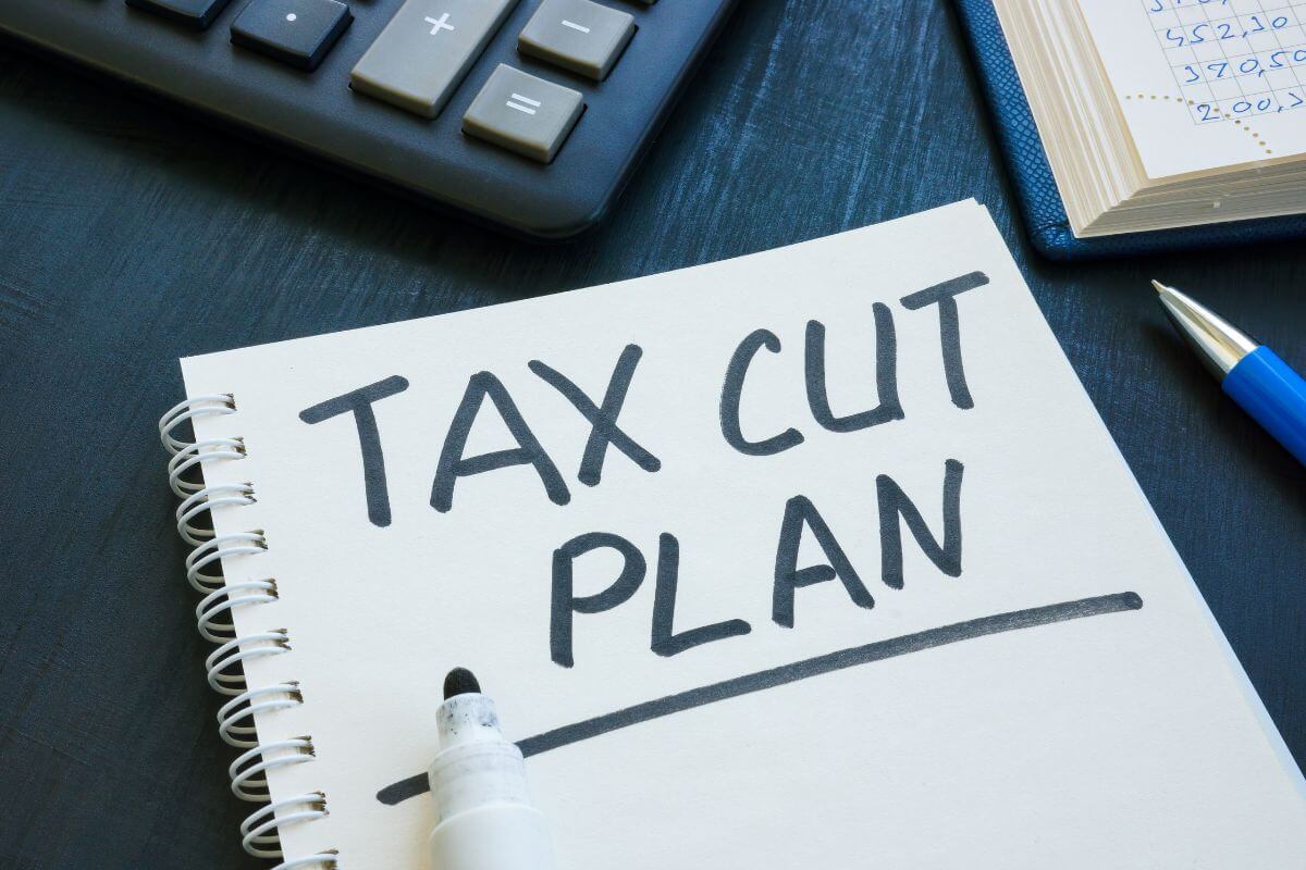 "Tax Cut Plan" Written on a Notebook Page Using a Black Marker