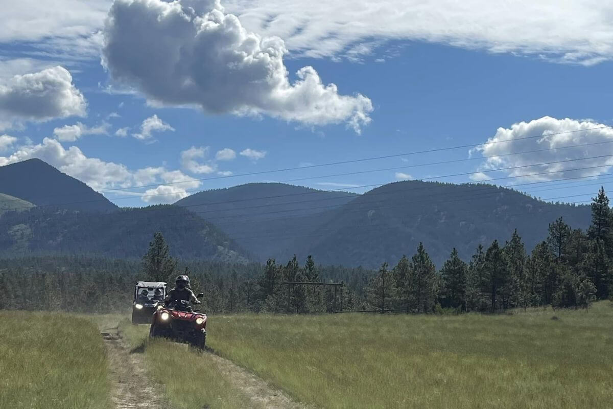 An adventurer enjoying a UTV ride along a scenic trail courtesy of Summer Star Ranch 