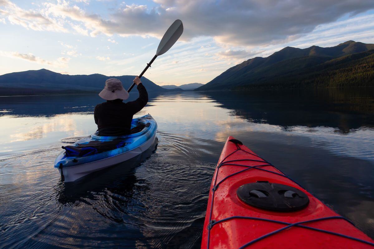 A person is paddling a kayak in Montana.