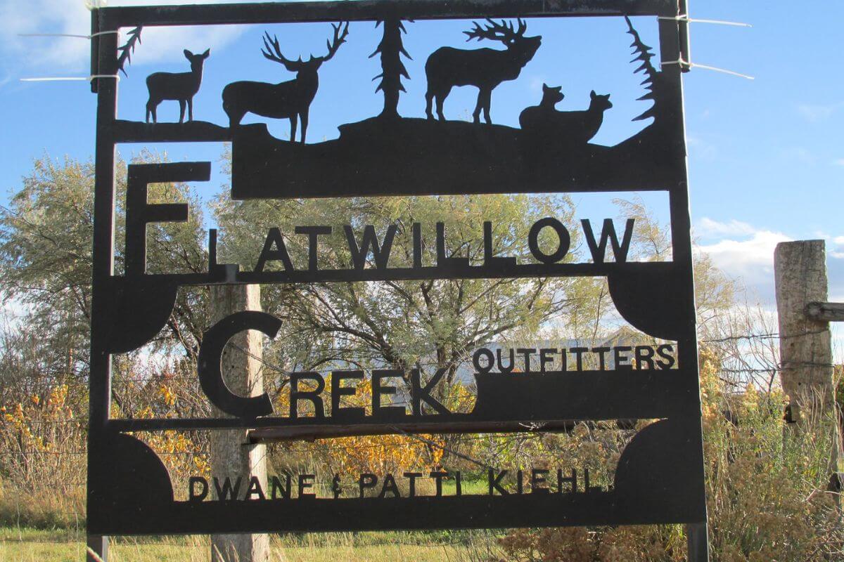 The Flatwillow Creek Outfitters signage in Winnett, Montana