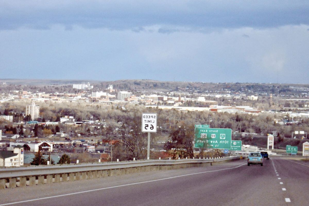 A car driving down a highway in Great Falls, Montana