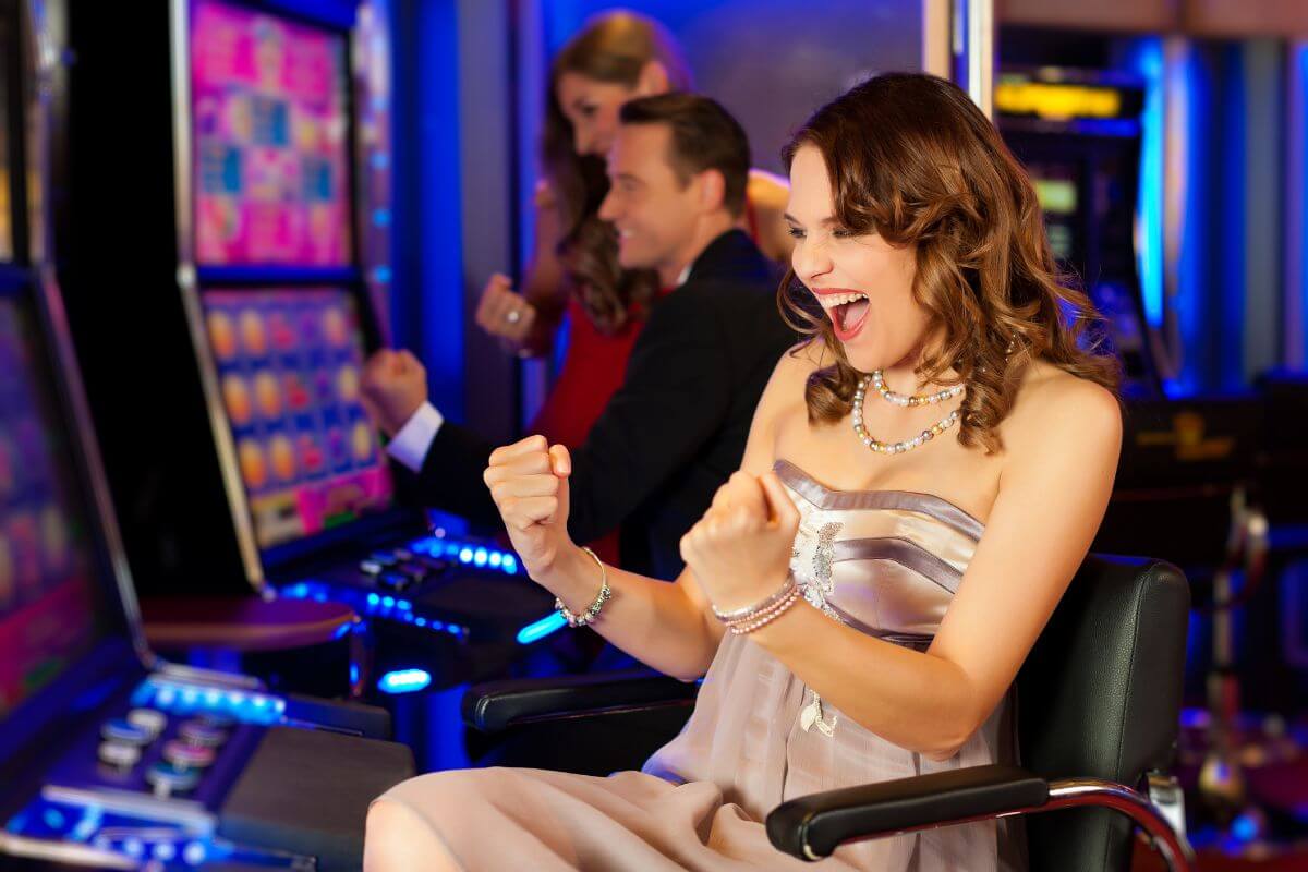 A woman in a chair playing a slot machine in Montana.